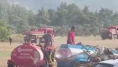 Traktörünü ve su tankerini alan yangına koştu