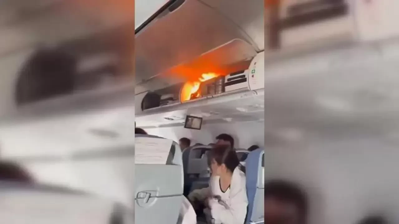 Havada panik anları: Çin havayolları uçağında el bagajı alev aldı