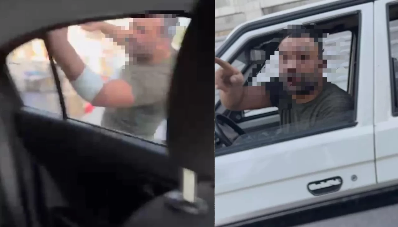 Trafikte tartıştığı kadınların otomobilini yumrukladı