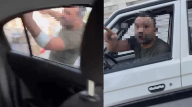 Trafikte tartıştığı kadınların otomobilini yumrukladı