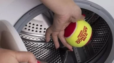 Yumuşatıcı kullanmaya son verecek formül! Tenis toplarıyla çamaşır makinenizde mucizeler yaratın