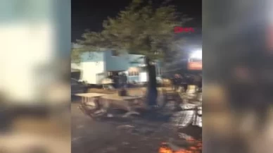 Müzik durmadı, onlar da durmadı! Yağmur altında unutulmaz düğün anı