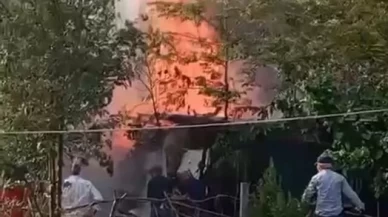 Apartmanlar arasında çıkan odunluk yangını paniğe yol açtı