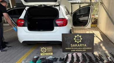 Polis memurunun aracından cephanelik çıktı