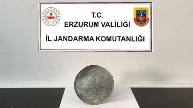 Piknik yapan kişi arazide bronz disk buldu
