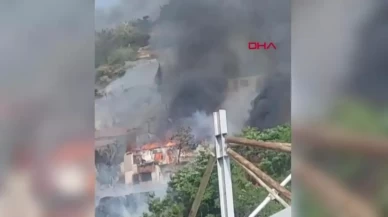 Ankara'da ağaçlık alanda çıkan yangın gecekondulara sıçradı