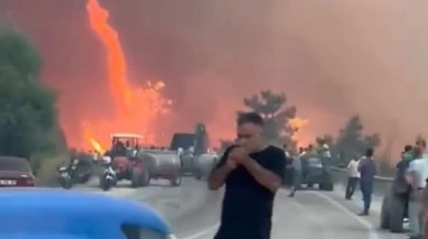 Alevler göğe ulaştı o aldırış etmeden sigarasını yaktı...