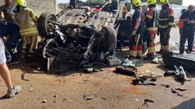 Takla atan otomobilde sıkışan 2 kişiyi itfaiye kurtardı