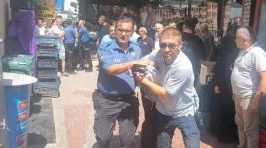 Kurusıkı silahla kuyumcu soymaya kalktı: Kuyumcu ve esnaftan meydan dayağı yedi