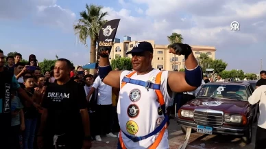 Eşref Mahrus, 20 araç çekerek Guinness rekoru kırdı