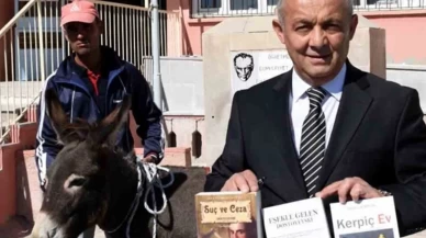 Ardahan'da bir gurbetçi eşekle dolaşıp öğrencilere kitap ve kırtasiye malzemesi dağıttı