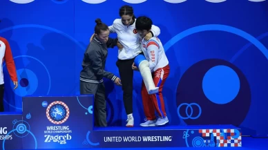 Evin Demirhan Yavuz, kürsüye rakiplerinin kucağında çıktı