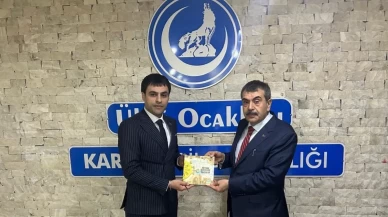 Ülkü Ocakları Karaman İl Başkanlığı, Bakan Tekin'e özel sayıyı sundu