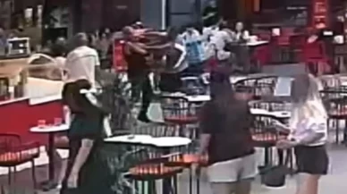 Polisten kaçan şüpheliyi tek yumrukla yere serdi!