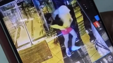 Pembe şort ve sarı perukla mağazayı soydu!
