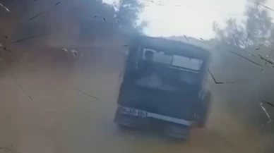 Yangın bölgesinde giden aracın uçuruma yuvarlandığı anlar kamerada