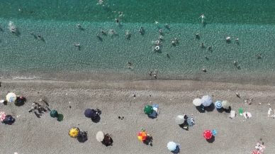 Termometre 31, deniz suyu 30 derece: Sahiller doldu taştı!