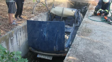 Otomobil sulama kanalına yuvarlandı