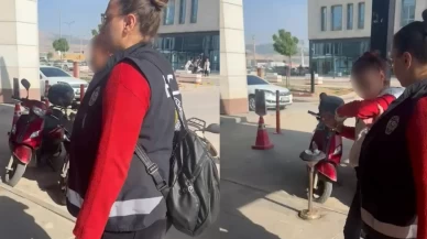 Çöpte karnını doyuran kediye taş atan kadına gözaltı!