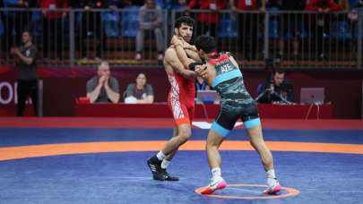 Bir altın madalya da Murat'tan