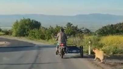 Köpeği motosikletin arkasına bağlayıp sürükledi