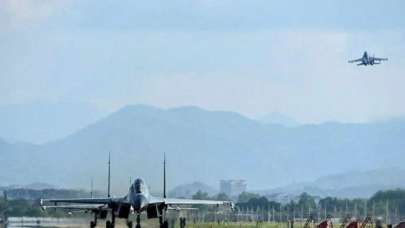 Çin 37 savaş uçağı ve 8 savaş gemisi...