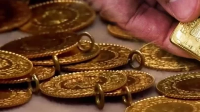 Altın yükselişe bir mola verdi: Rekor sonrası kar realizasyonu