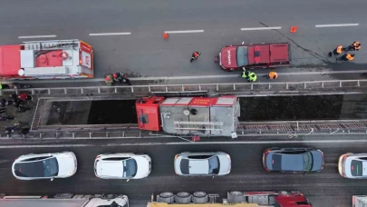 İtfaiye aracı iki köprü arasında asılı kaldı