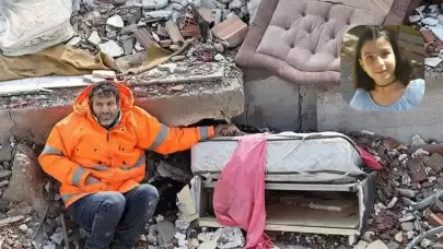Enkaz altındaki kızının elini bir an bırakmamıştı!