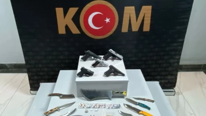 Uşak'ta iş yerinde ruhsatsız silah ve uyuşturucu materyal ele geçirildi