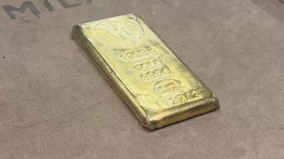 Altının ons fiyatı ABD ile Çin arasında tırmanan ticaret savaşıyla rekor yeniledi