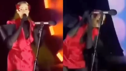 Derya Uluğ'a konserde su şişesi fırlatıldı