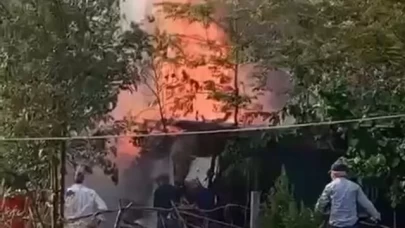 Apartmanlar arasında çıkan odunluk yangını paniğe yol açtı