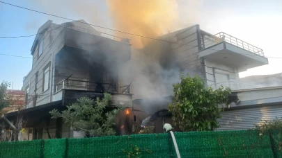 Garajdaki araçta çıkıp eve sıçrayan yangın söndürüldü