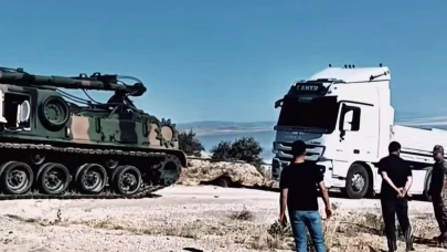 Yolda kalan tırların imdadına zırhlı tank yetişti