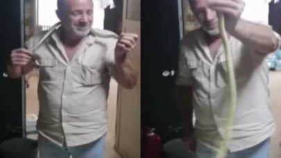 2 metrelik yılana "kanka" dedi, boynuna doladı