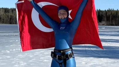 Milli sporcu Erken, Finlandiya'da dünya rekoru kırdı