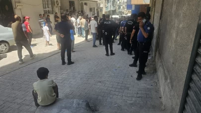 Öldürdüğü eşini korkuluklara asarak intihar süsü verdi!