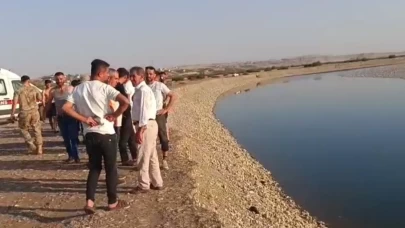 Oğlunu kurtarmak isteyen baba da akıntıya kapıldı