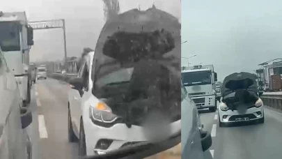 Bursa'da görenleri şaşkına çeviren tamirat! Seyir halindeki aracın kaputunda çalıştı
