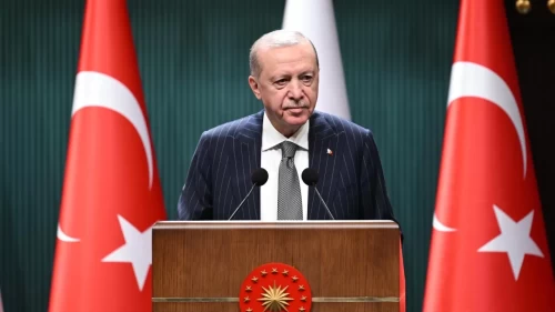 Cumhurbaşkanı Erdoğan, başpehlivan Erkan Taş'ı tebrik etti