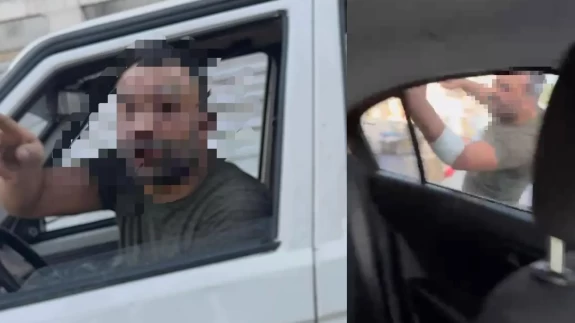 Trafikte tartıştığı kadınların otomobilini yumrukladı