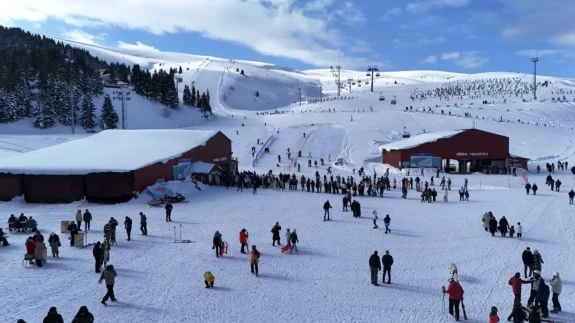 Kayak, snowboard ve kızak keyfi bir arada