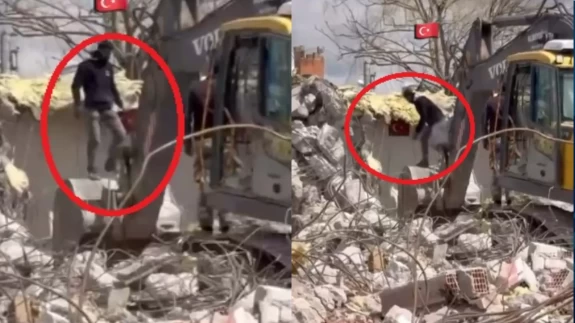 Kepçe operatöründen alkışlanacak hareket: İşini bırakıp Türk bayrağına koştu!
