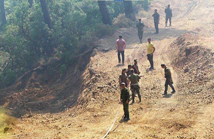 Yangınlara ‘Gardaş' müdahalesi! Alevlerin arasına daldılar 2