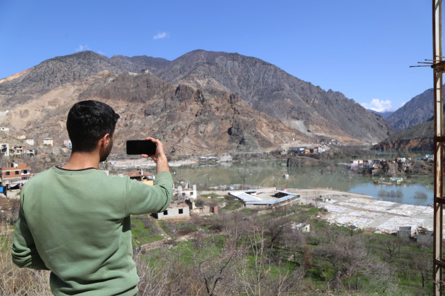 sular-altinda-kalacak-olan-ilcede-esnaflar-15720444_5676_m