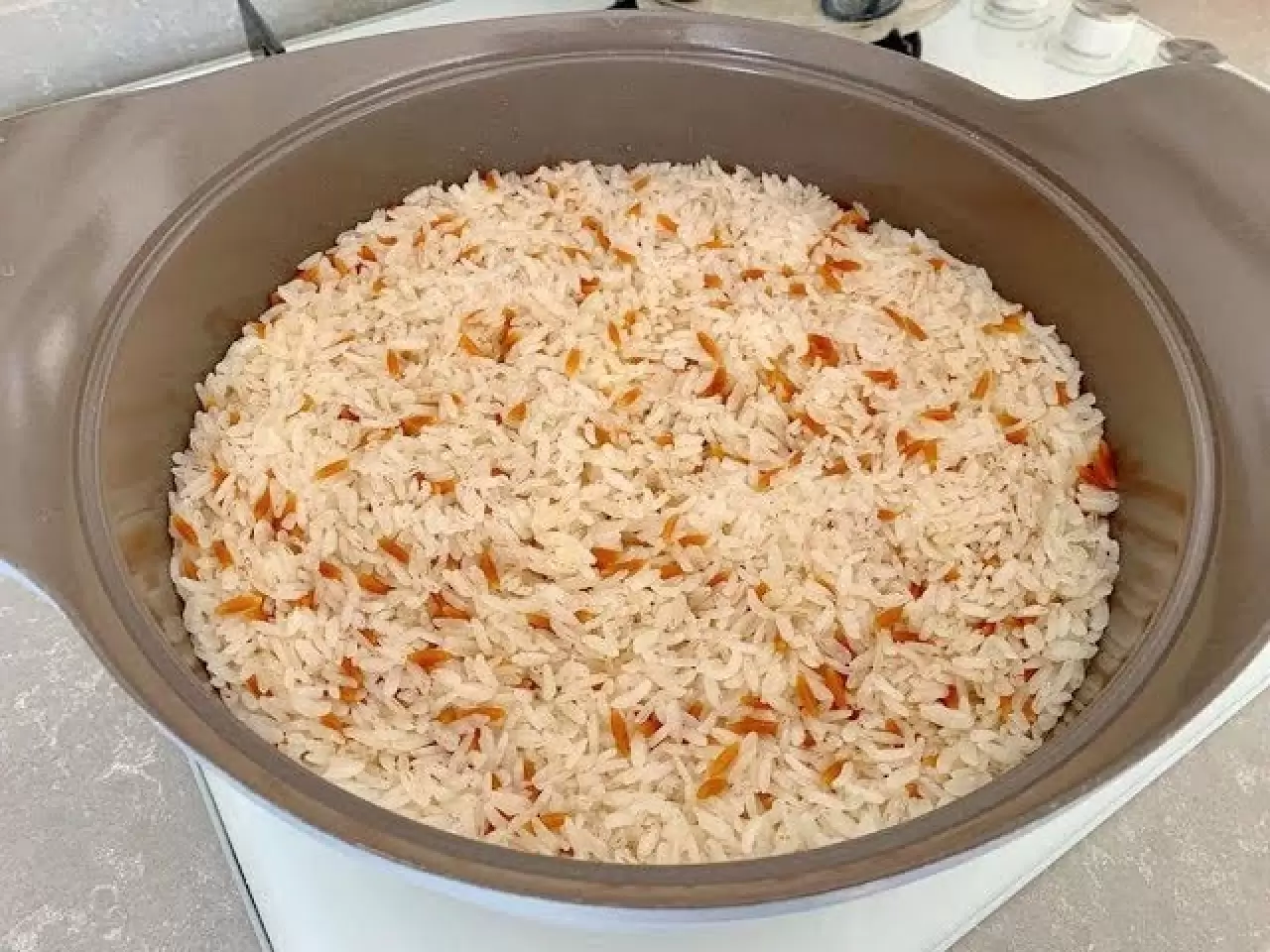 Pirinç pilavını tane tane yapan tüyo; Ayrıca pilav bembeyaz parlak oluyor 3